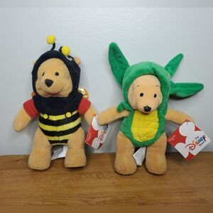 The Disney Store set of Winnie the pooh bears in costume